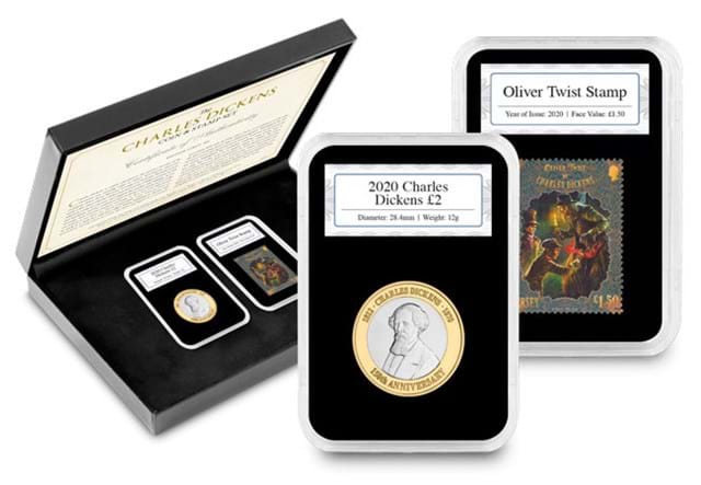 Charles Dickens Coin and Stamp Set slabs beside display box