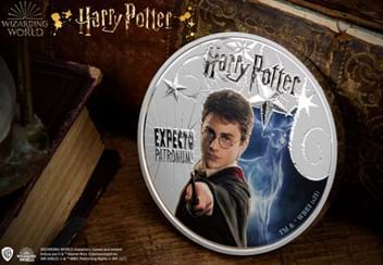 Harry-Potter-Glow-in-the-dark-Patronus-Silver-5oz-Coin-Product-Images-Lifestyle-Front-Updated.jpg