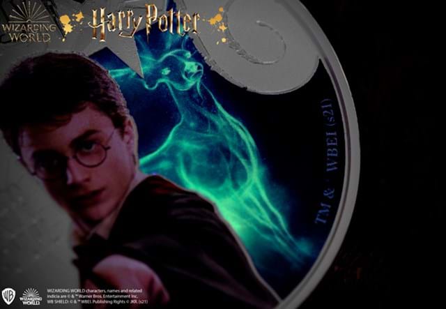 Harry-Potter-Glow-in-the-dark-Patronus-Silver-5oz-Coin-Product-Images-Lifestyle-Glow-Close-Up-Updated.jpg