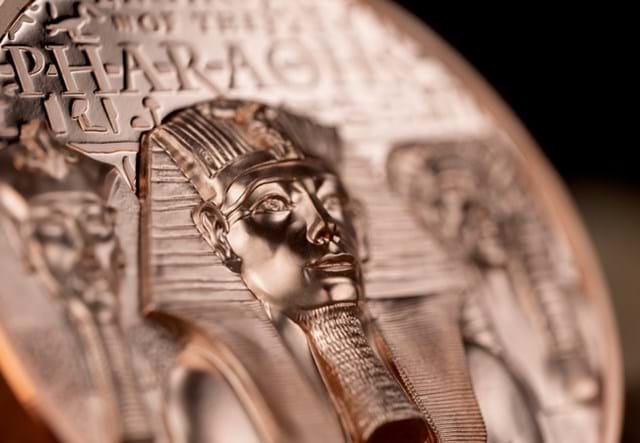 Close-up of Legacy of the Pharaohs Coin with black background