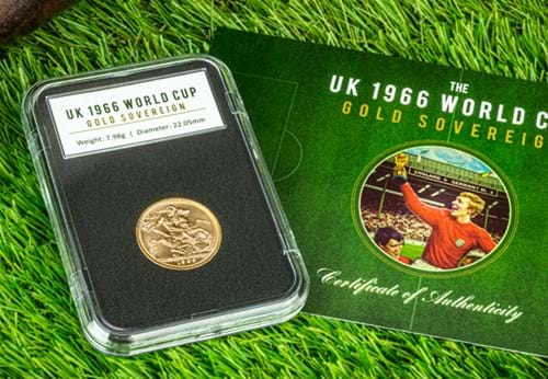 The UK 1966 Gold Sovereign on grass beside Certificate of Authenticity