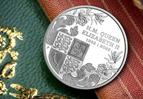 This 1oz silver coin honours Her Majesty Queen Elizabeth IIs Platinum Jubilee. It features the Shield of the Royal Coat of Arms, and a fan of wattle with Her Majestys first and current coin effigies.