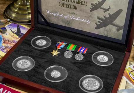 Set of 5 original 1945 dated silver coins and 3 replica medals