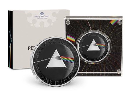 This 2026 dated UK Silver Proof 1oz coin has been issued by The Royal Mint to celebrate the iconic rock band Pink Floyd, depicting the iconic prism from The Dark Side of the Moon. 